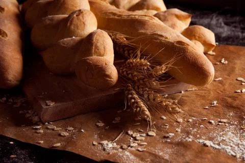 Assortment of baked bread on table Foto stock