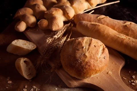 Assortment of baked bread on table Stock Photos