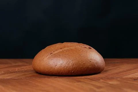 Assortment of baked bread on table Stock Photos