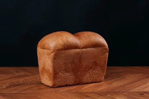 Assortment of baked bread on table Stock Photos