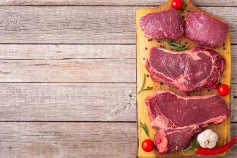 Assortment of beef steak . T-bone , ribeye and fillet mignon Stock Photos