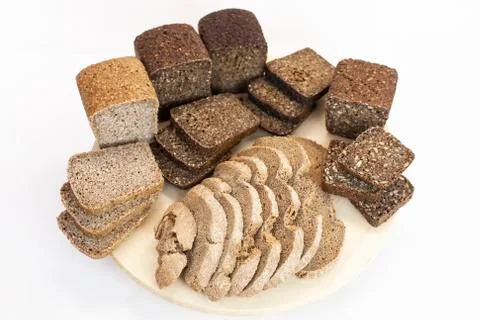 Assortment of bread on the kitchen table on a white isolated background Stock-Fotos