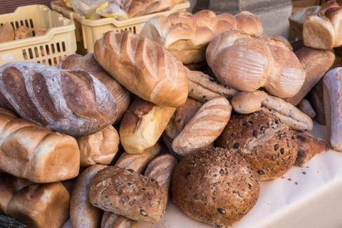 Assortment of bread in the shop.  Different fresh bread on market. Stock Photos