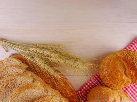 Assortment of breads on wooden table Stock Photos