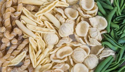 Assortment of different dry pasta types, top view. Stock Photos