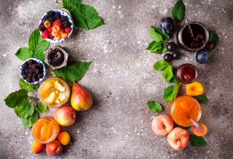 Assortment of different jams in jars Stock Photos