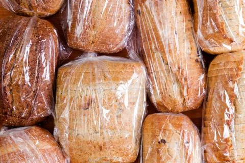 Assortment of different sliced loaves of bread Stock Photos