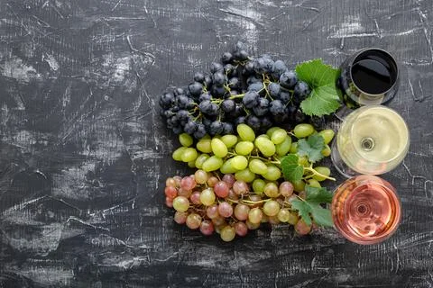Assortment different types of wine and grape grade varieties. White rose red  Stock Photos