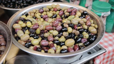 Assortment of different variation of olives that is in the bowls is in the Stock Footage 181649617
