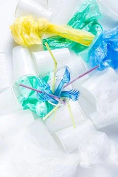 Assortment of disposable plastic Assortment of disposable plastic, cups, c... Stock Photos