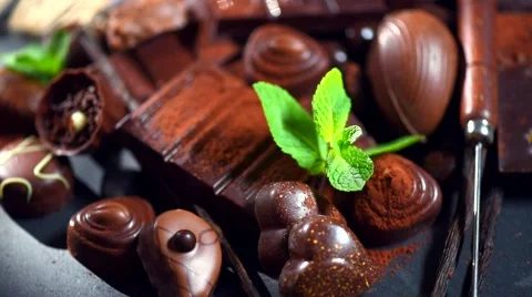 Assortment of fine chocolates rotation 360 background. Dark and milk chocolate Vídeo Stock 50048364