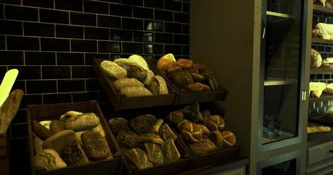 Assortment of fresh artisan breads displayed in a cozy bakery setting Stock Illustration