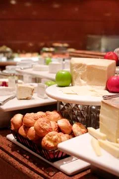 Assortment of fresh pastry on table in buffet Stock Photos