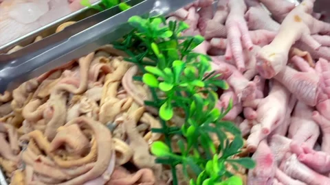 Assortment of fresh raw chicken meat parts displayed at market 库存影片 340483943