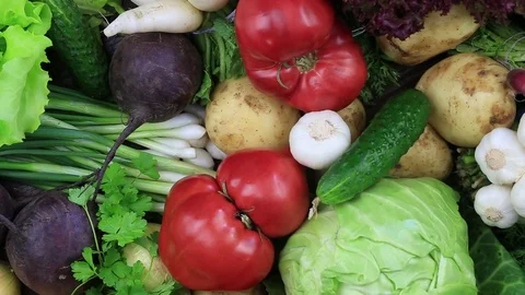 Assortment of fresh raw vegetables rotates. Close up Stock Footage 79517095