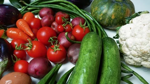 Assortment of Fresh Vegetables on White Surface, A colorful assortment of f.. Stock Footage 305032017
