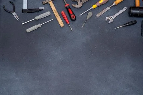 Assortment of Hand Tools on Dark Background top view Stock Photos