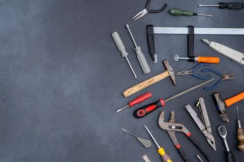 Assortment of Hand Tools on Dark Background Stock Photos