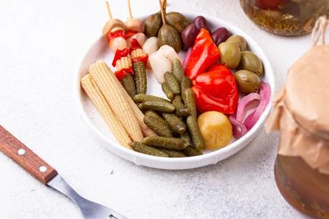 Assortment of marinated or pickled vegetable. Stock Photos