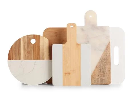 Assortment of modern kitchen cutting boards with wood and marble textures for Stock Photos