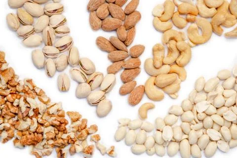 Assortment of nuts on white background. Group of mixed nuts. Top view Fotos de archivo
