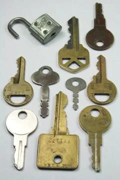 Assortment of Old Keys and Small Lock Stock Photos