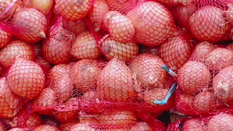 Assortment of onion in Basket, showcasing versatile vegetable. Stock Footage 267350173