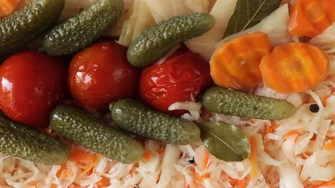 Assortment of pickled vegetables slowly moving close-up Stock Footage 336464493