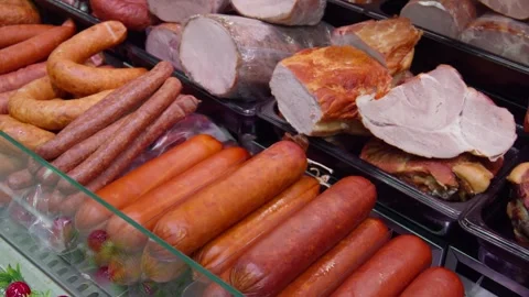 Assortment of Processed Meats Presented in a Market Display Stock-Footage 301388611