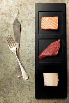 Assortment of raw fish Stock Photos