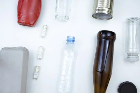 Assortment of Recyclable Objects on White Background Stock Photos