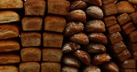 Assortment of Rustic Artisan Bread Loaves Stock Footage 319019672