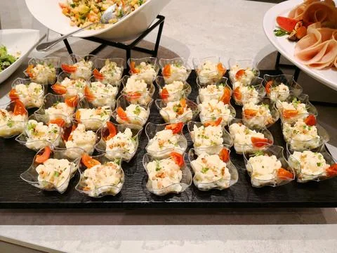 Assortment of snacks on the buffet table. 스톡 사진