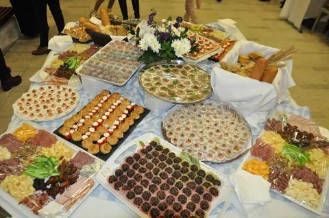 Assortment of snacks on the buffet table. Stock Photos