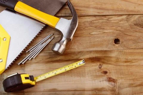 Assortment of tools on wood Stock Photos