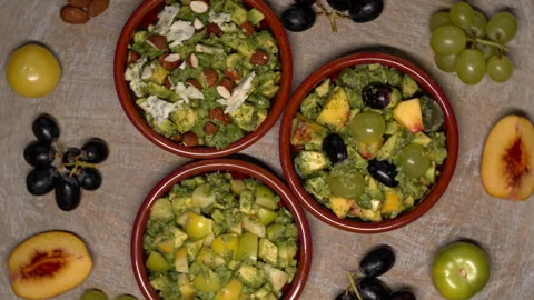Assortment of various kinds of chunky guacamole. Stock Footage 342348633