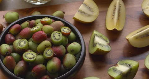 An assortment of various kiwi fruit varieties. Stock Footage 330134962