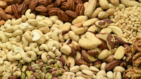 Assortment of various nuts, rotating Stock Footage 143165281