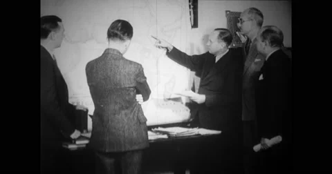 Asst. Sec. Sumner Welles describing German infiltration to officers Stock Footage 43445165