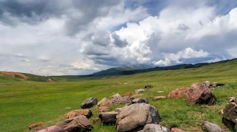 Assy plato with the green fields and clouds on front in Almaty Kazakhstan Stock Footage 53446785