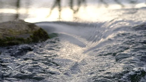 Asten, austria, 06 march 2019, small waterfall at river mitterwasser near the 库存影片 126959907