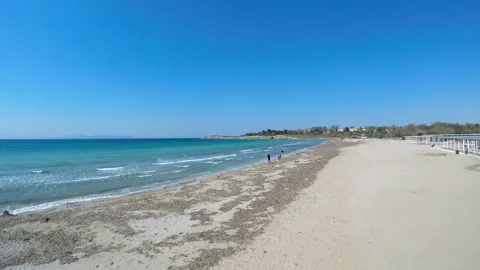 Asteras beach in Glyfada is found in front of the famous coastal settlement.. Stock Footage 230182470