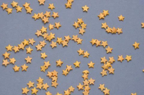 Asterisks on a gray background. Foto stock