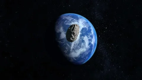 The asteroid falls to Earth. An asteroid appears in the frame, rotates and Stock Footage 141872277