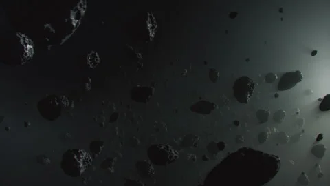 An Asteroid Field in darkness of space with a bit of light Stock-Footage 240394602