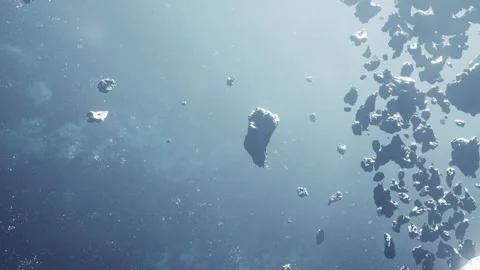 Asteroid field in outer space with scattered rocks and dark background Stock Footage 344166249