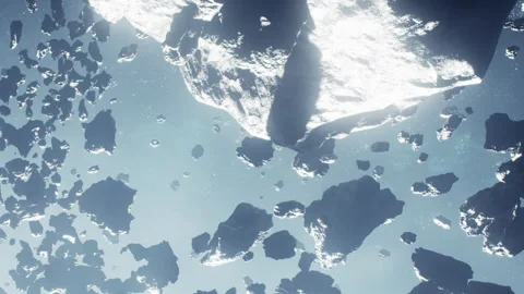 Asteroid field in space with rocks and ice floating in vast emptiness Stock Footage 343946420