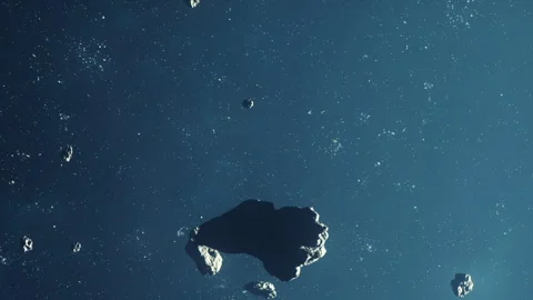 Asteroid field in space with various rocks floating among stars Stock Footage 343541171
