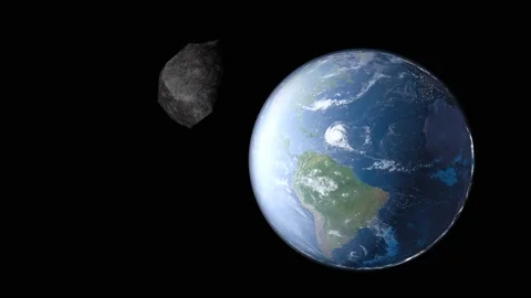 An asteroid flies past the earth. Stock Footage 164973122