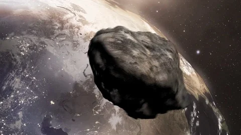Asteroid Flying Fast Towards Earth Stock Footage 77188380